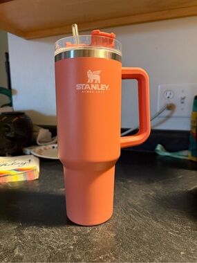 Stanley Coral Orange Travel Mug with Handle